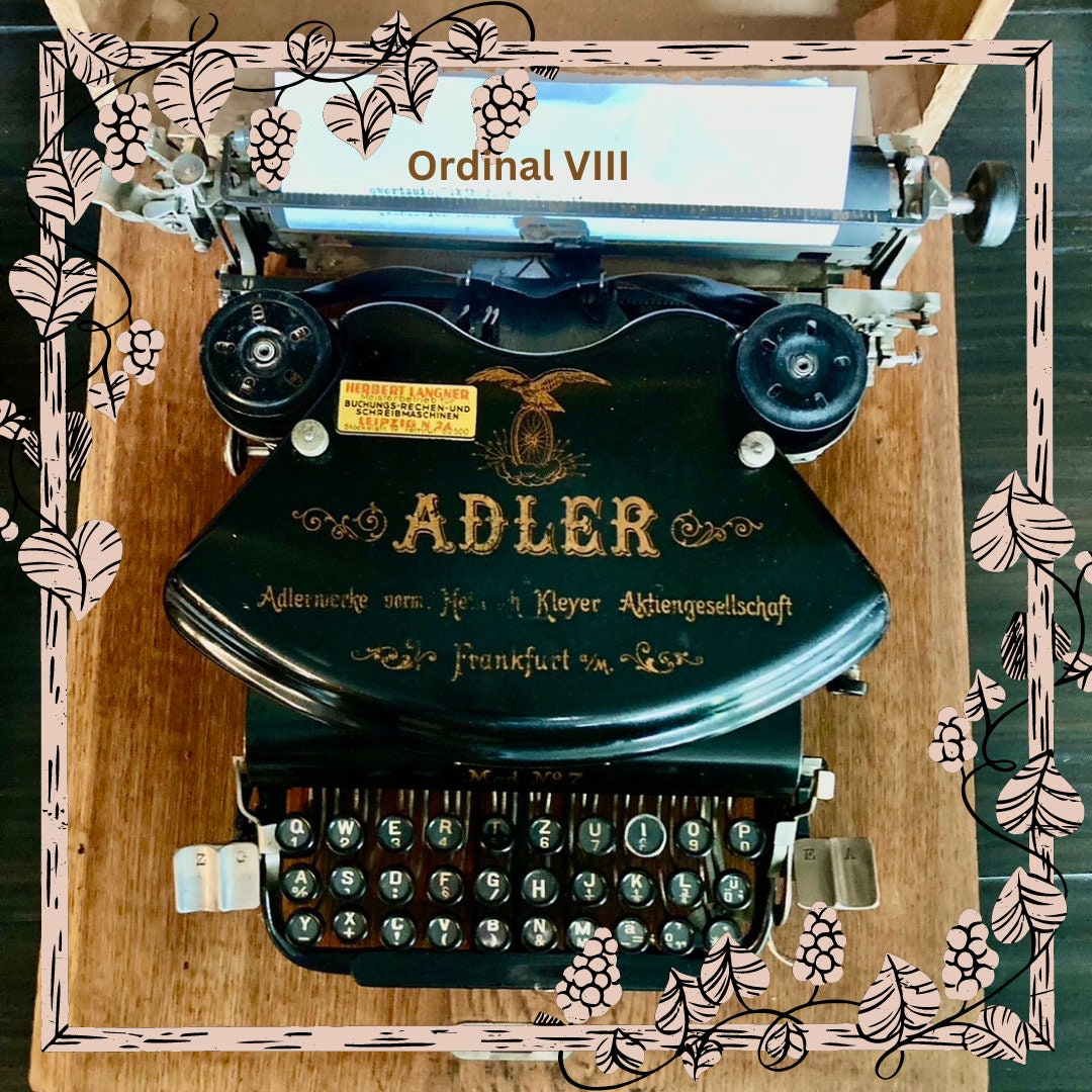 Adler model no.7 antique typewriter with wooden box.