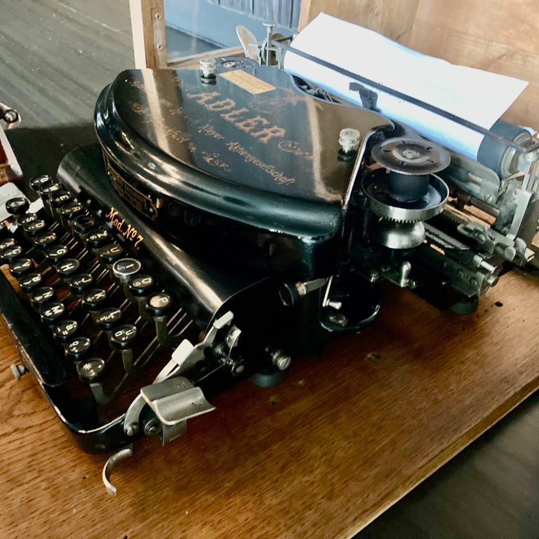 Adler model no.7 antique typewriter with wooden box.