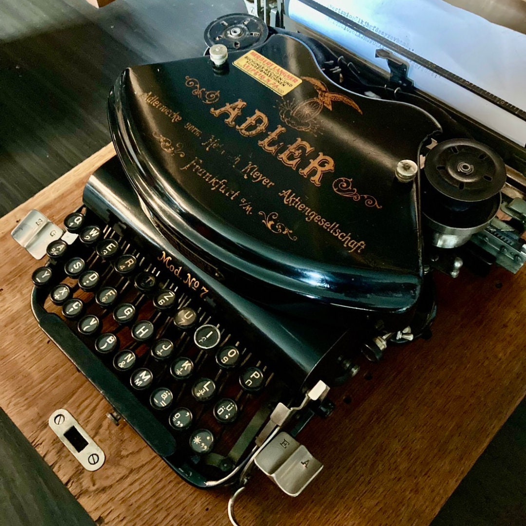 Adler model no.7 antique typewriter with wooden box.