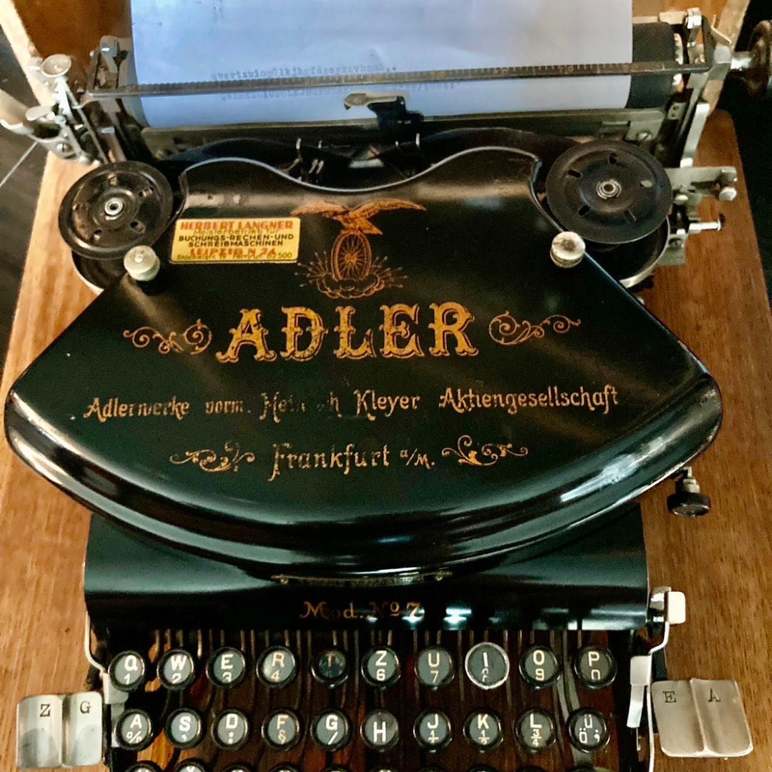 Adler model no.7 antique typewriter with wooden box.